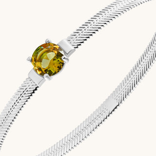 Bangle in sterling silver with champagne yellow Diaspore, close-up detail