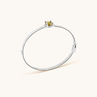 Bangle in sterling silver with champagne yellow Diaspore, side view