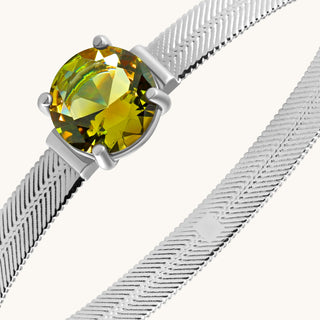 Bangle in sterling silver with champagne yellow Diaspore, close-up detail