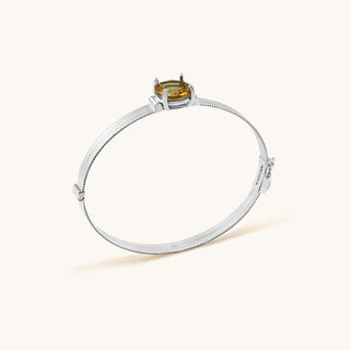 Bangle in sterling silver with champagne yellow Diaspore, side view