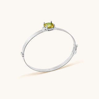 Bangle in sterling silver with kiwi green Diaspore, side view