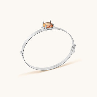 Bangle in sterling silver with lychee pink Diaspore, side view