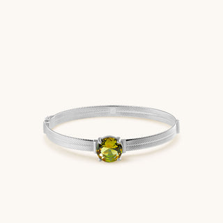 Bangle in sterling silver with champagne yellow Diaspore, laid flat