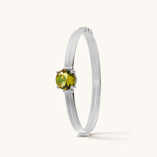 Bangle in sterling silver with champagne yellow Diaspore, upright view