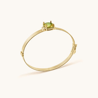Bangle in gold-plated sterling silver with kiwi green Diaspore, side view
