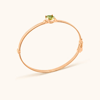 Bangle in sterling silver with kiwi green Diaspore, side view