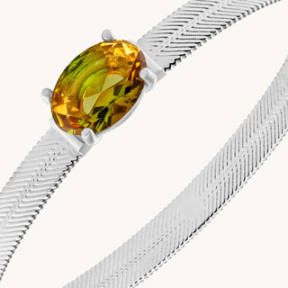 Bangle in sterling silver with champagne yellow Diaspore, close-up detail