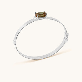 Bangle in sterling silver with champagne yellow Diaspore, side view