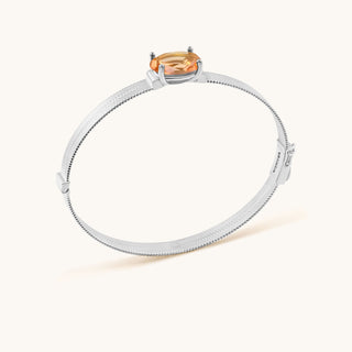 Bangle in sterling silver with lychee pink Diaspore, side view