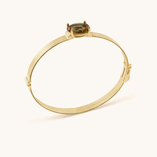 Bangle in gold-plated sterling silver with champagne yellow Diaspore, side view
