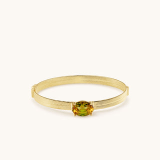Bangle in gold-plated sterling silver with champagne yellow Diaspore, laid flat