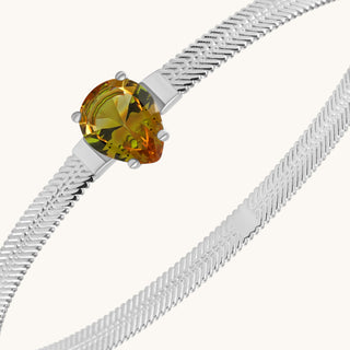 Bangle in sterling silver with champagne yellow Diaspore, close-up detail