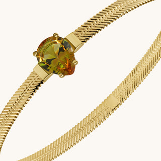 Bangle in gold-plated sterling silver with champagne yellow Diaspore, close-up detail