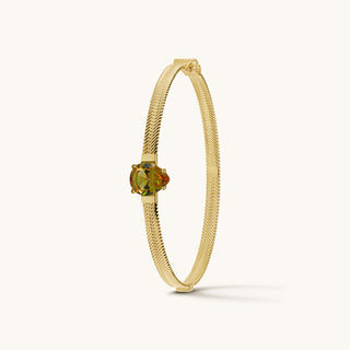 Bangle in gold-plated sterling silver with champagne yellow Diaspore, upright view