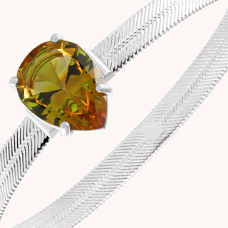 Bangle in sterling silver with champagne yellow Diaspore, close-up detail