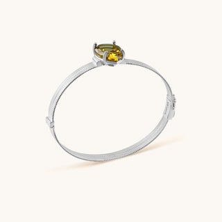 Bangle in sterling silver with champagne yellow Diaspore, side view