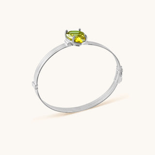 Bangle in sterling silver with kiwi green Diaspore, side view