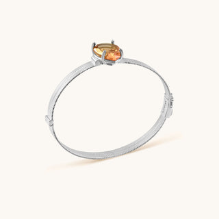 Bangle in sterling silver with lychee pink Diaspore, side view