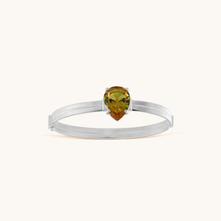 Bangle in sterling silver with champagne yellow Diaspore, viewed from above