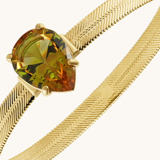 Bangle in gold-plated sterling silver with champagne yellow Diaspore, close-up detail
