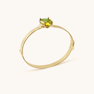 Bangle in gold-plated sterling silver with kiwi green Diaspore, side view