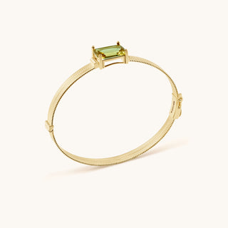 Bangle in gold-plated sterling silver with kiwi green Diaspore, side view