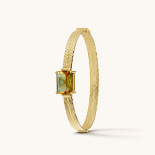 Bangle in gold-plated sterling silver with champagne yellow Diaspore, upright view