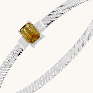 Bangle in sterling silver with champagne yellow Diaspore, close-up detail