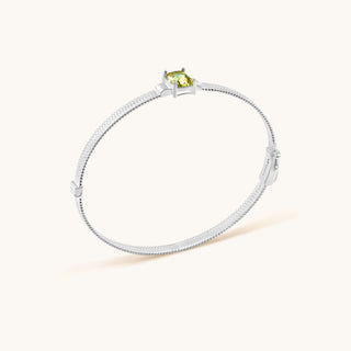 Bangle in sterling silver with kiwi green Diaspore, side view