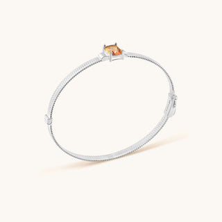 Bangle in sterling silver with lychee pink Diaspore, side view