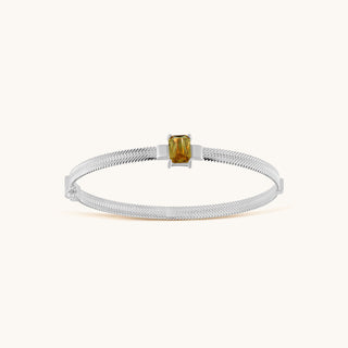 Bangle in sterling silver with champagne yellow Diaspore, viewed from above