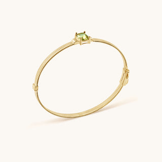 Bangle in gold-plated sterling silver with kiwi green Diaspore, side view