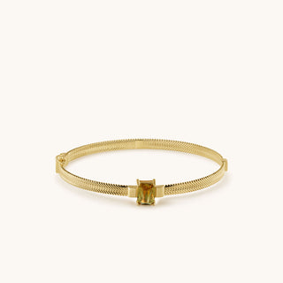 Bangle in gold-plated sterling silver with champagne yellow Diaspore, laid flat