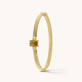 Bangle in gold-plated sterling silver with champagne yellow Diaspore, upright view