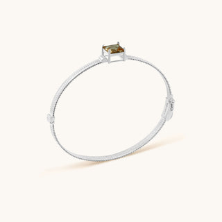 Bangle in sterling silver with champagne yellow Diaspore, side view