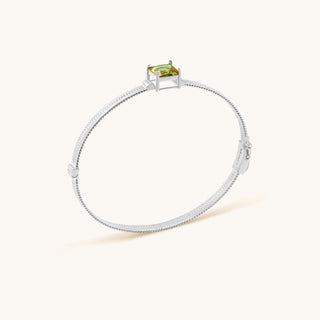 Bangle in sterling silver with kiwi green Diaspore, side view