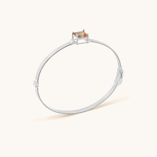 Bangle in sterling silver with lychee pink Diaspore, side view