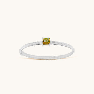 Bangle in sterling silver with champagne yellow Diaspore, viewed from above