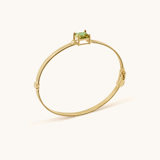 Bangle in gold-plated sterling silver with kiwi green Diaspore, side view