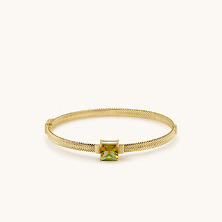 Bangle in gold-plated sterling silver with champagne yellow Diaspore, laid flat