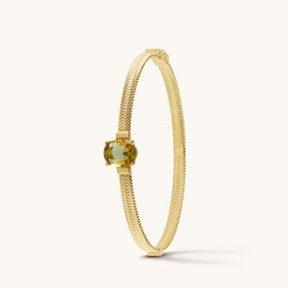 Bangle in gold-plated sterling silver with champagne yellow Diaspore, upright view
